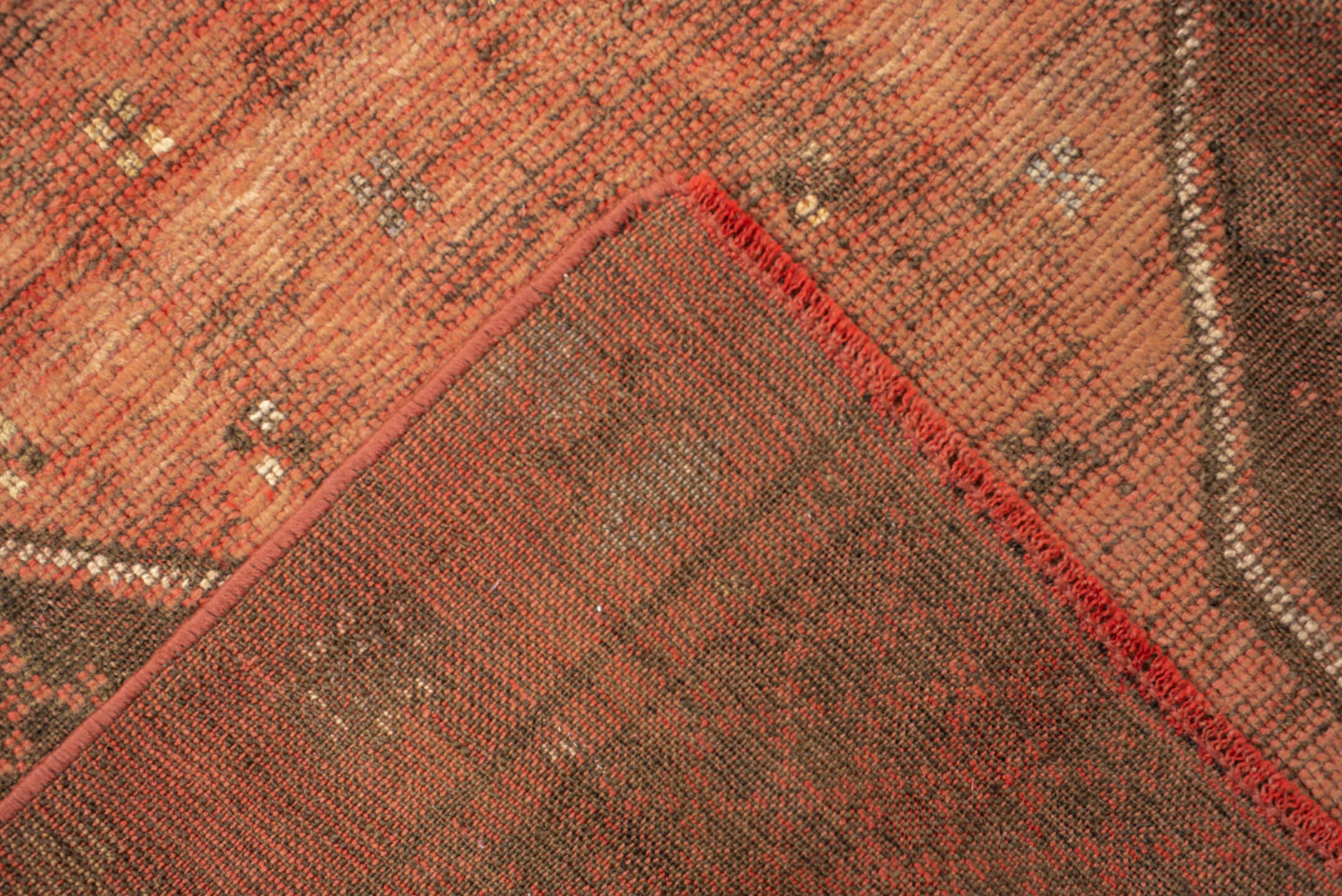 3' x 10' one-of-a-kind handmade vintage Oushak runner rug. Color palette: brown, dark salmon, pink, tan