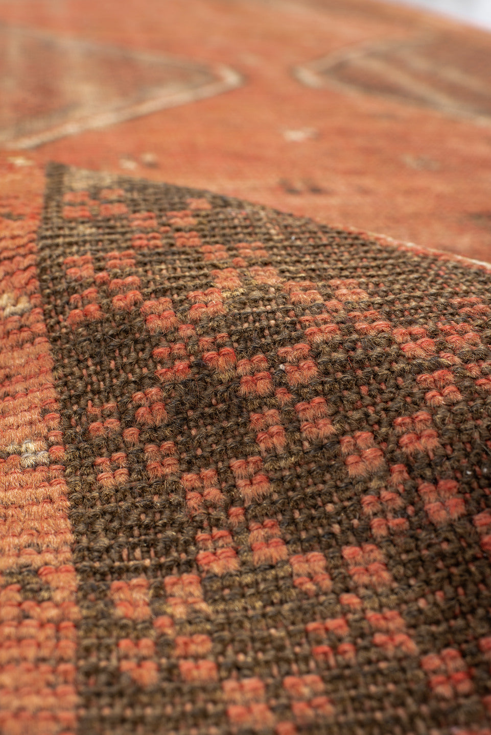 3' x 10' one-of-a-kind handmade vintage Oushak runner rug. Color palette: brown, dark salmon, pink, tan
