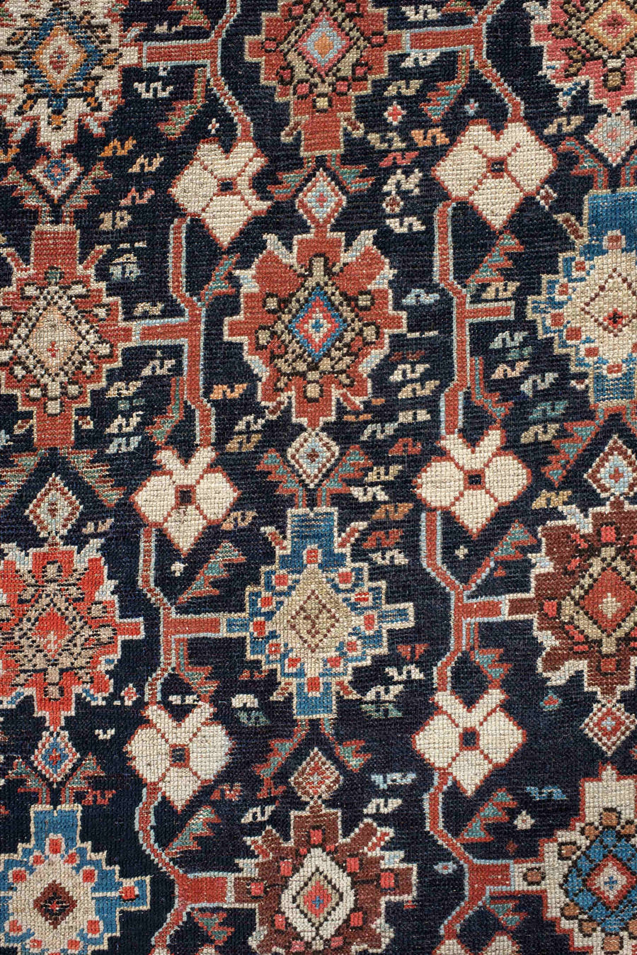 4' x 9' one-of-a-kind handmade antique Karabagh runner rug. Color palette: navy, terra cotta, ivory, light blue, rust, brown