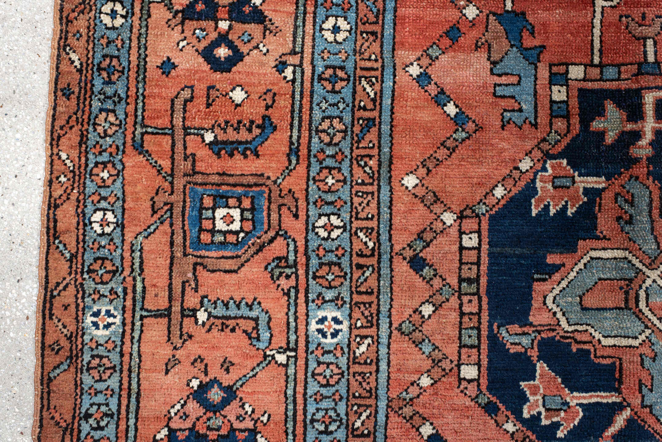 10' x 13' one-of-a-kind handmade antique Serapi large size rug. Color palette: terra cotta, navy, ivory, rust, sky blue