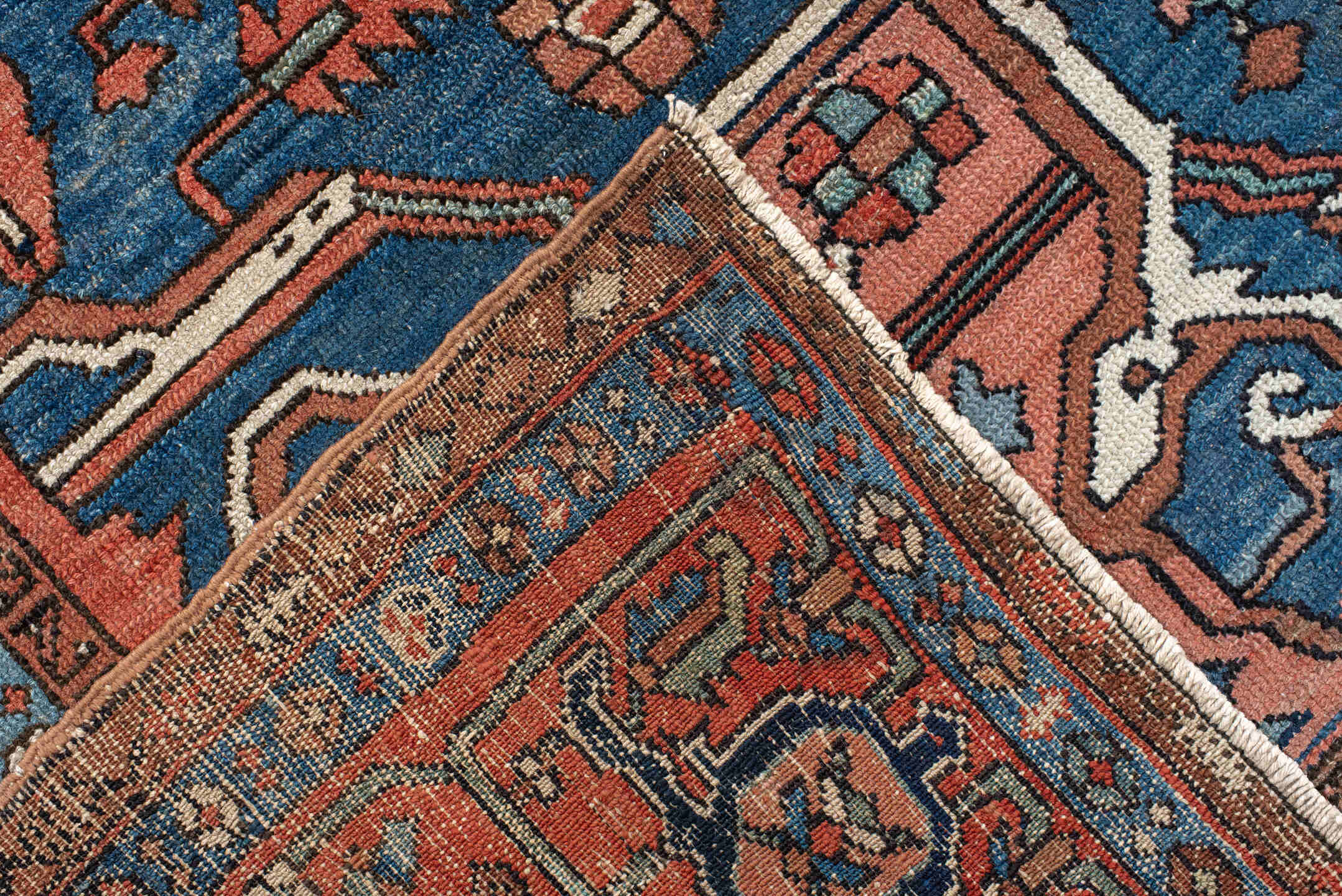 10' x 13' one-of-a-kind handmade antique Serapi large size rug. Color palette: terra cotta, navy, ivory, rust, sky blue