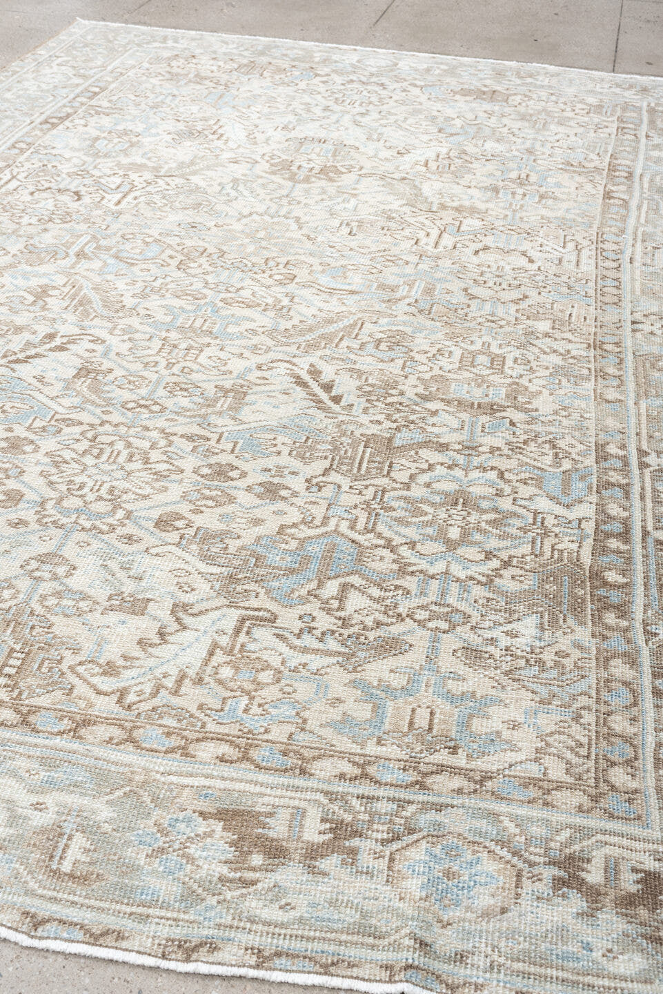 8' x 10' one-of-a-kind handmade vintage Heriz large size rug. Color palette: ivory, pale blue, taupe, beige, light gray