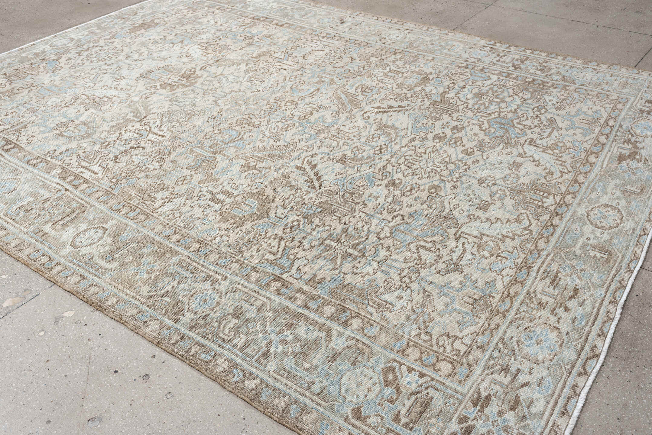 8' x 10' one-of-a-kind handmade vintage Heriz large size rug. Color palette: ivory, pale blue, taupe, beige, light gray