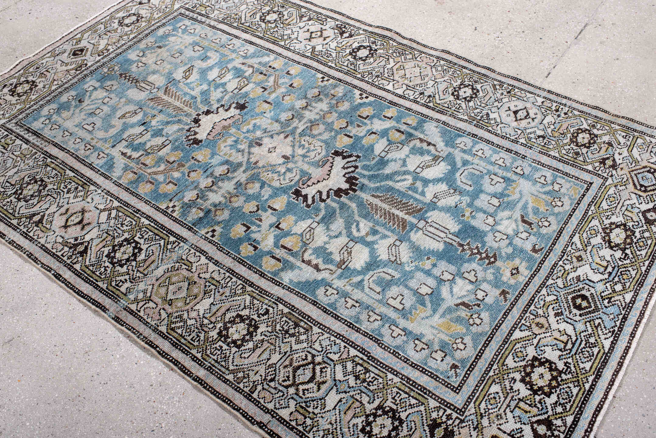4' x 7' one-of-a-kind handmade antique Hamadan rug. Color palette: sky blue, ivory, charcoal, sage, taupe, gold, brown