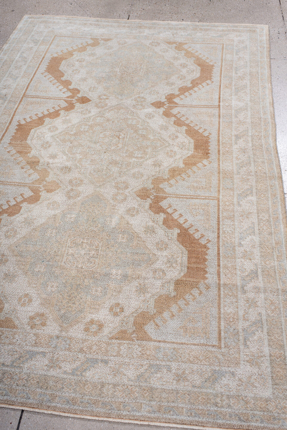 4' x 7' one-of-a-kind handmade antique Anatolian rug. Color palette: ivory, camel, pale blue, cream, taupe, beige