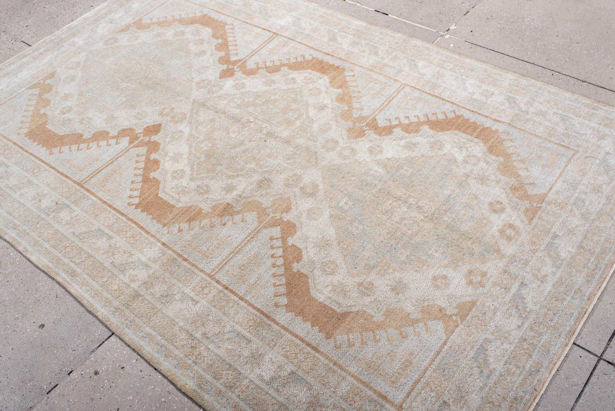 4' x 7' one-of-a-kind handmade antique Anatolian rug. Color palette: ivory, camel, pale blue, cream, taupe, beige