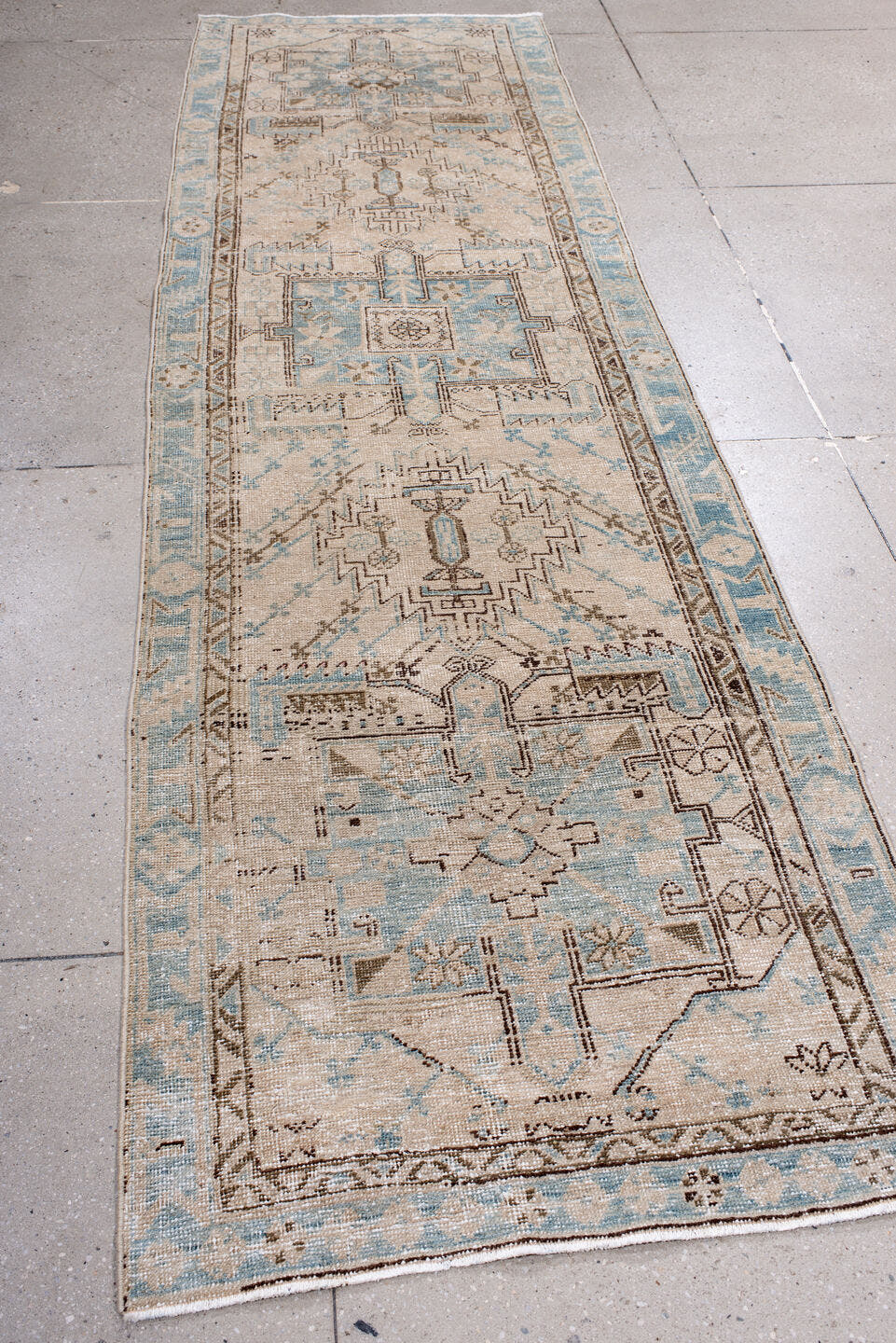 3' x 11' one-of-a-kind handmade antique Heriz runner rug. Color palette: ivory, sky blue, taupe, brown, camel, light blue
