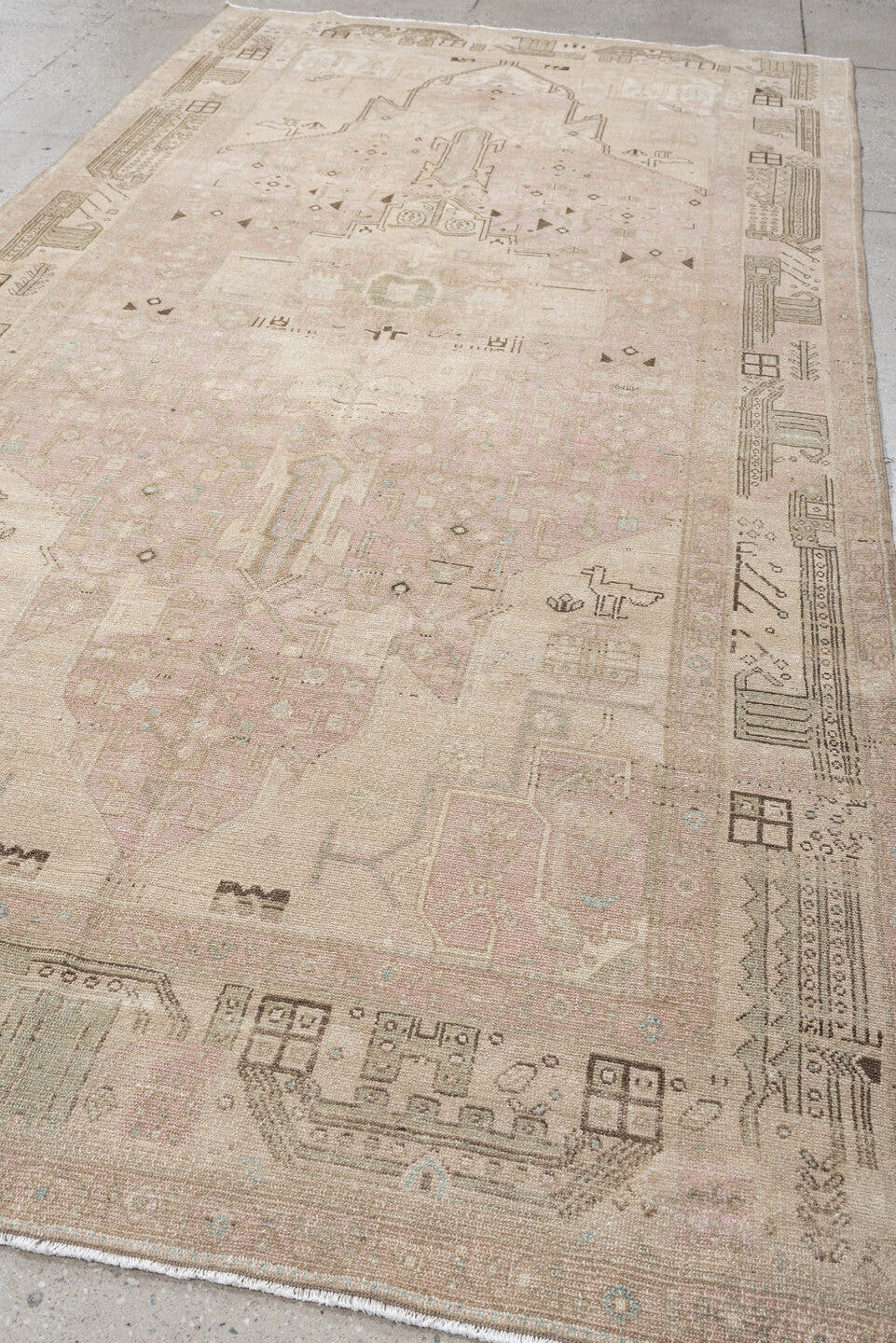 5' x 11' one-of-a-kind handmade vintage Malayer rug. Color palette: ivory, blush, taupe, camel, brown, pale blue, pink