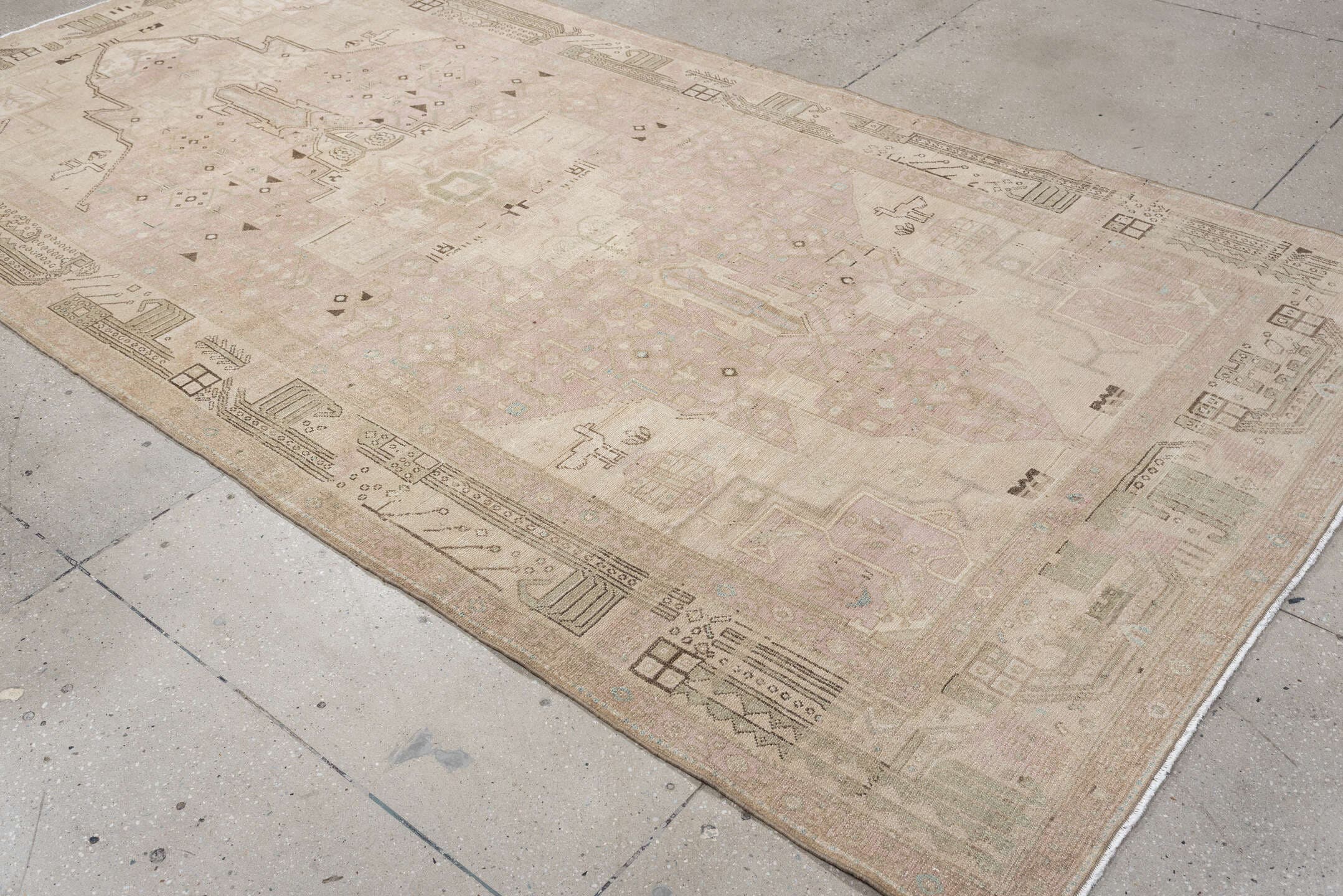 5' x 11' one-of-a-kind handmade vintage Malayer rug. Color palette: ivory, blush, taupe, camel, brown, pale blue, pink