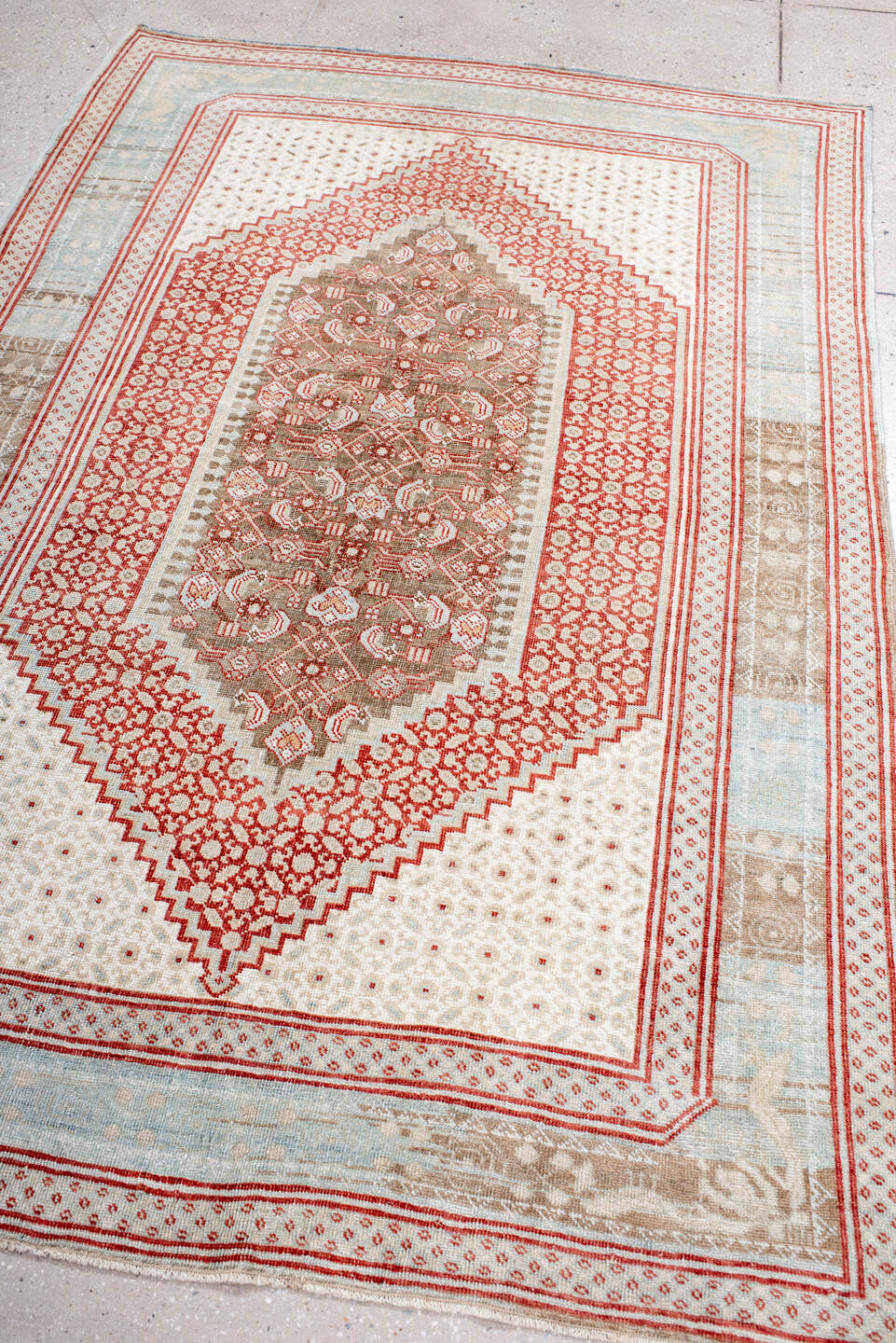 4' x 7' one-of-a-kind handmade vintage Sivas rug. Color palette: ivory, pale blue, rust, taupe, camel, light blue
