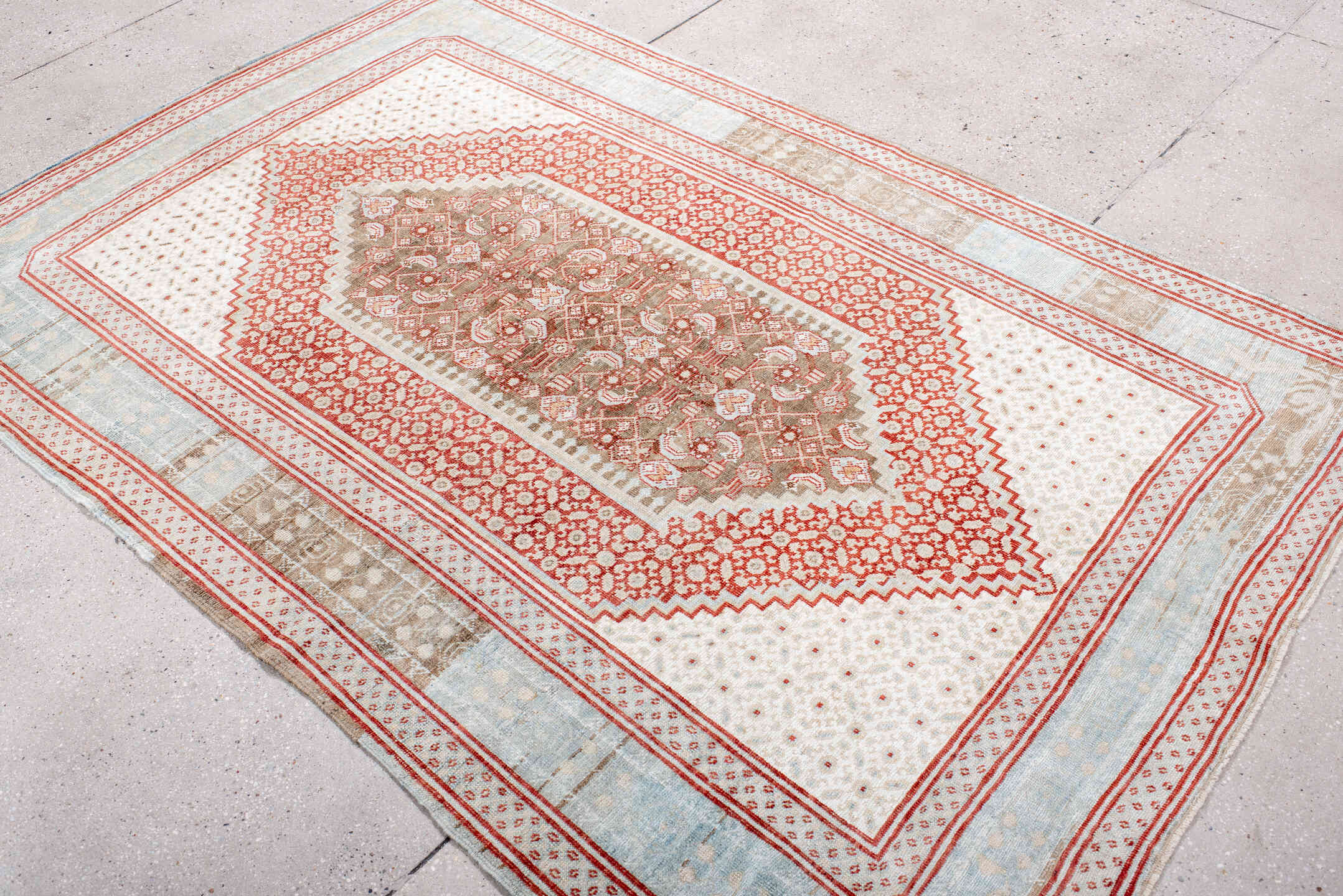 4' x 7' one-of-a-kind handmade vintage Sivas rug. Color palette: ivory, pale blue, rust, taupe, camel, light blue