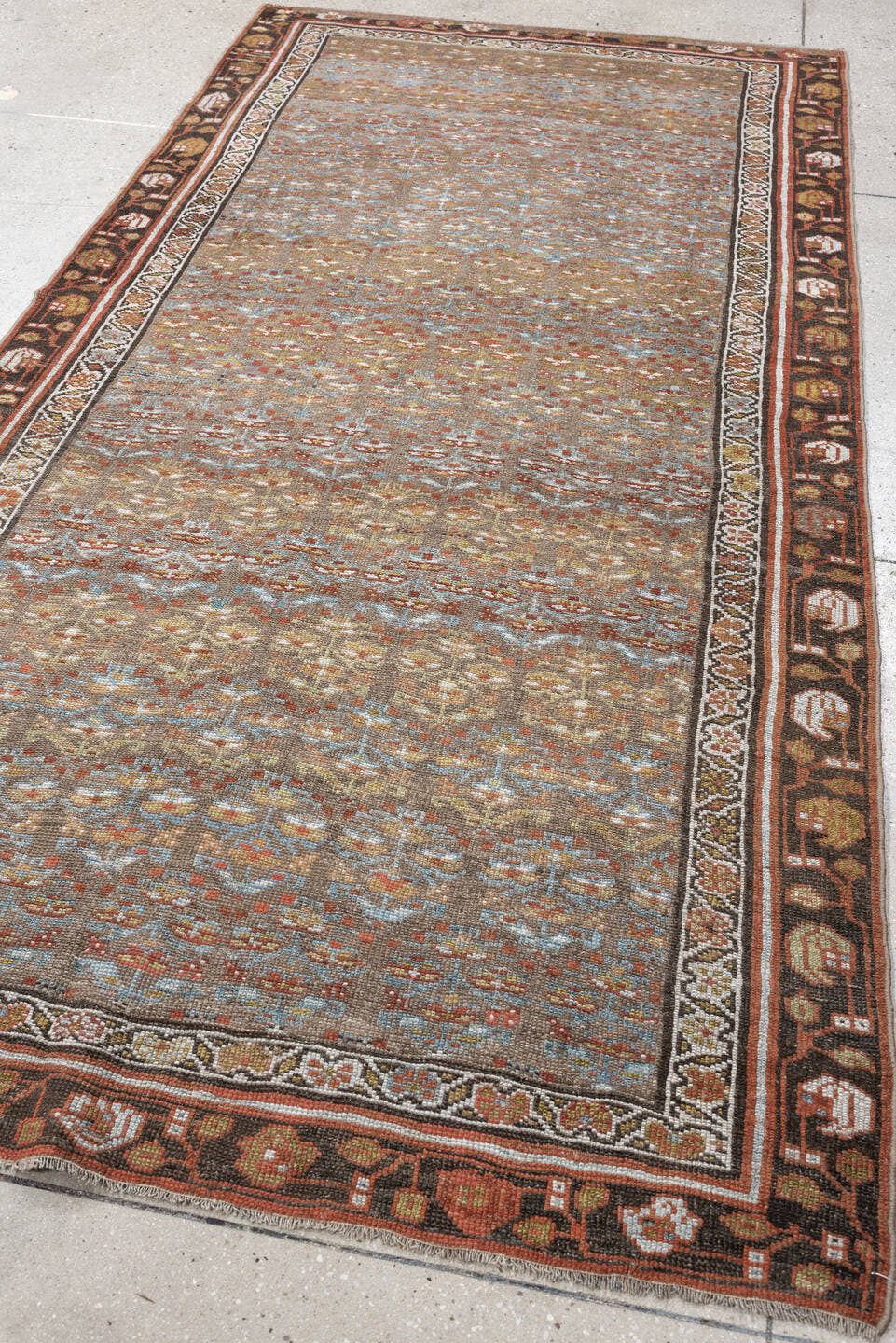 4' x 8' one-of-a-kind handmade antique NW Persian runner rug. Color palette: camel, rust, sky blue, ivory, brown, taupe