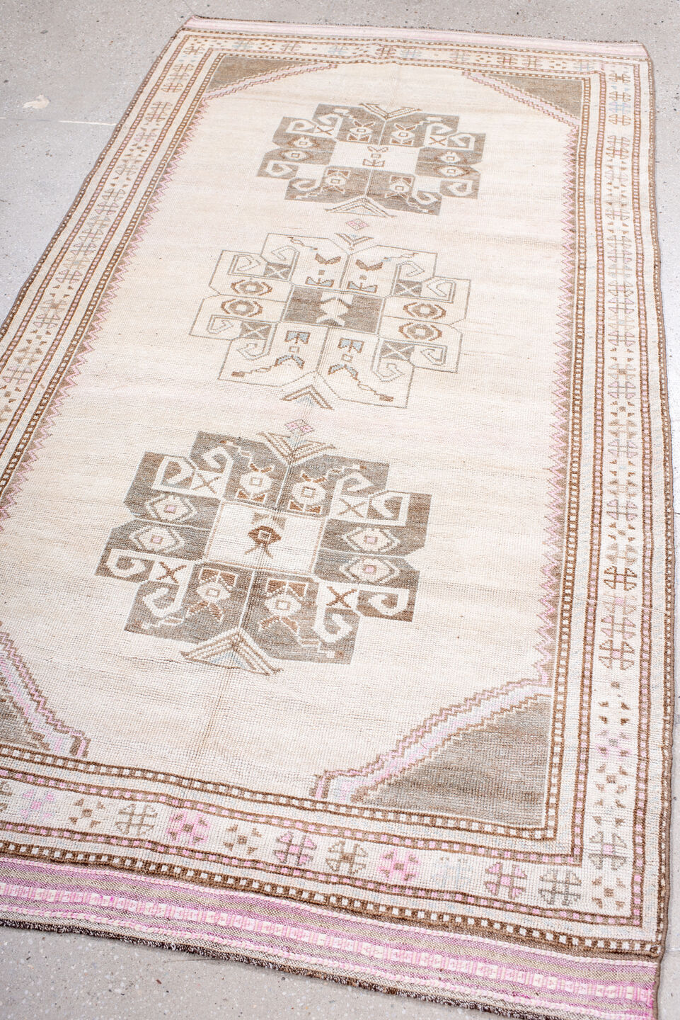 4' x 7' one-of-a-kind handmade antique Anatolian rug. Color palette: ivory, taupe, blush, camel, rose, brown, beige, gray