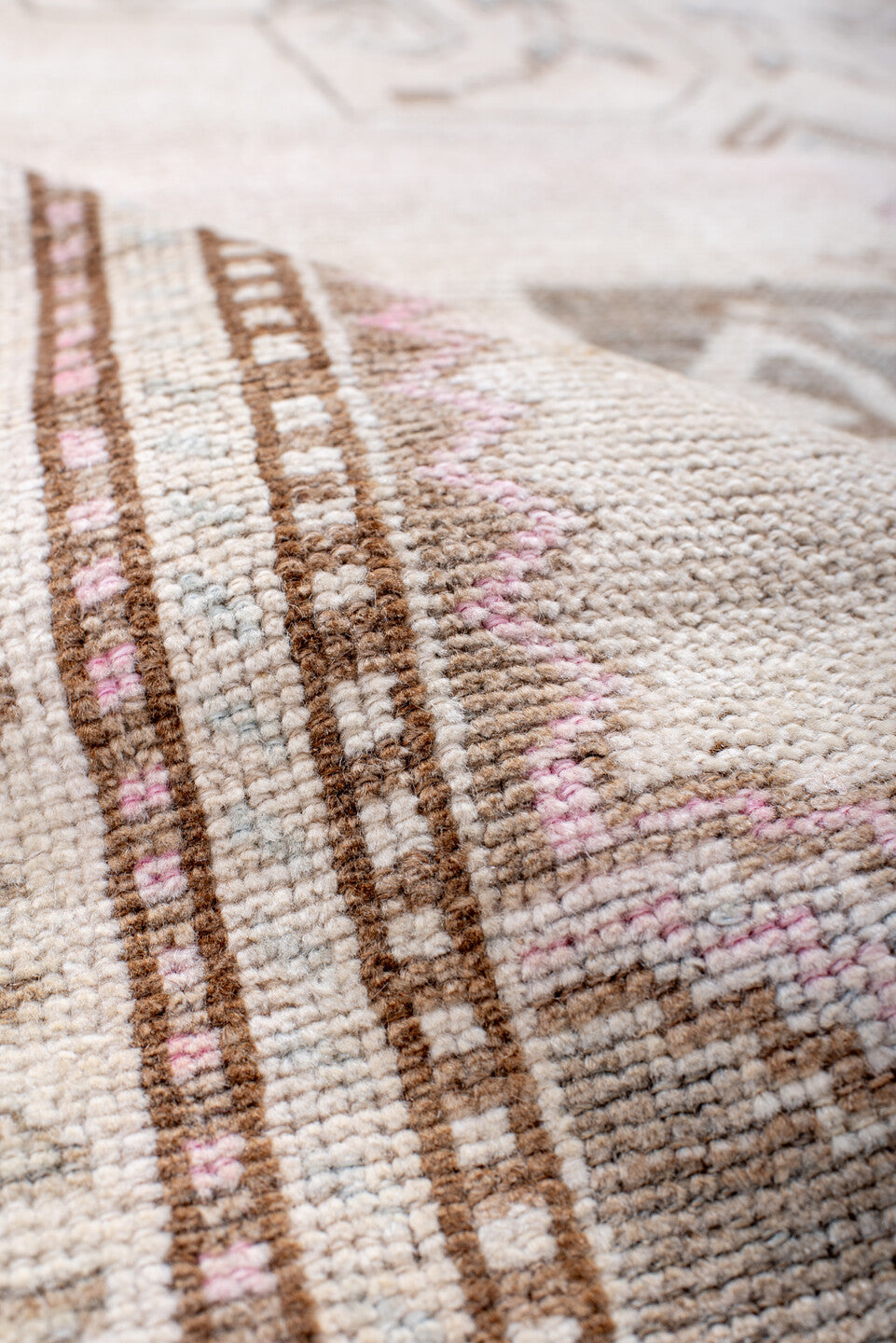 4' x 7' one-of-a-kind handmade antique Anatolian rug. Color palette: ivory, taupe, blush, camel, rose, brown, beige, gray
