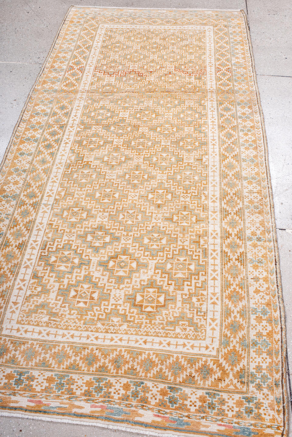 3' x 7' one-of-a-kind handmade vintage Belouch runner rug. Color palette: ivory, camel, taupe, pale blue, sand, beige, gray