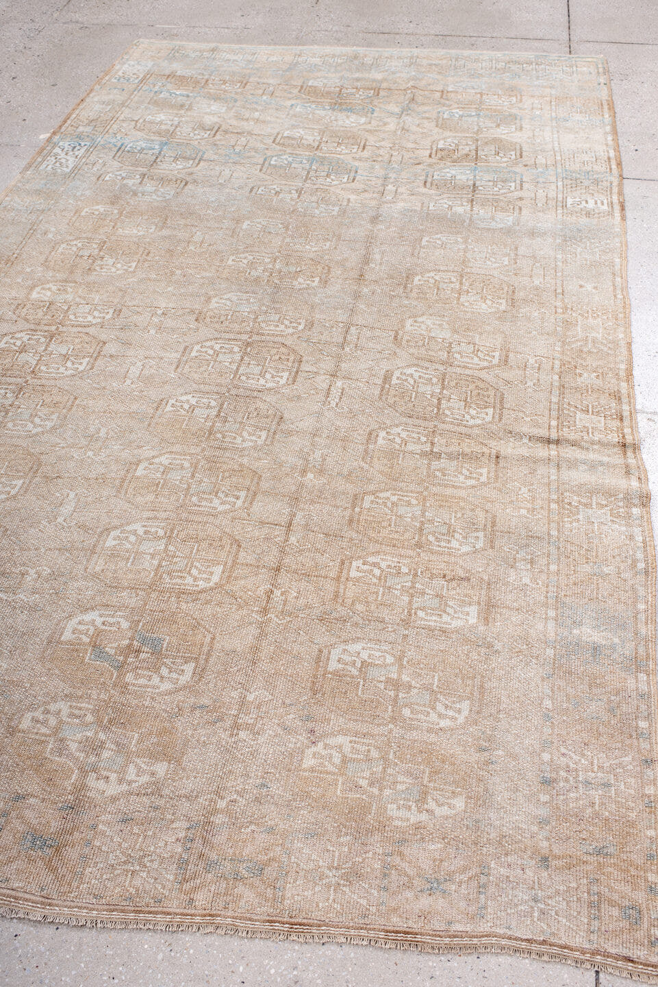 5' x 9' one-of-a-kind handmade antique Afghan medium size rug. Color palette: camel, ivory, taupe, light blue, beige, gray