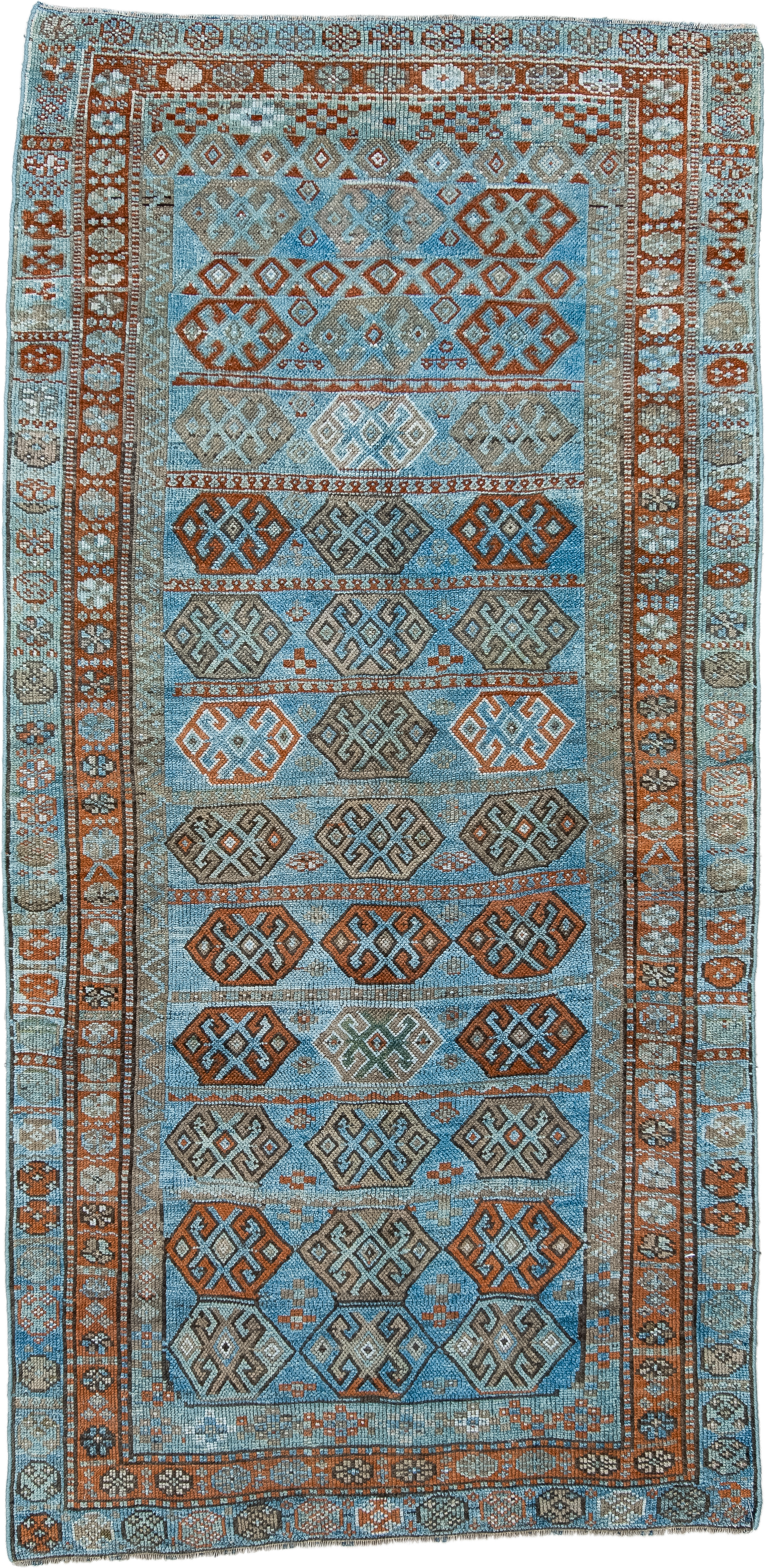 4' x 8' one-of-a-kind handmade antique Kurd runner rug. Color palette: sky blue, rust, taupe, ivory, slate, camel