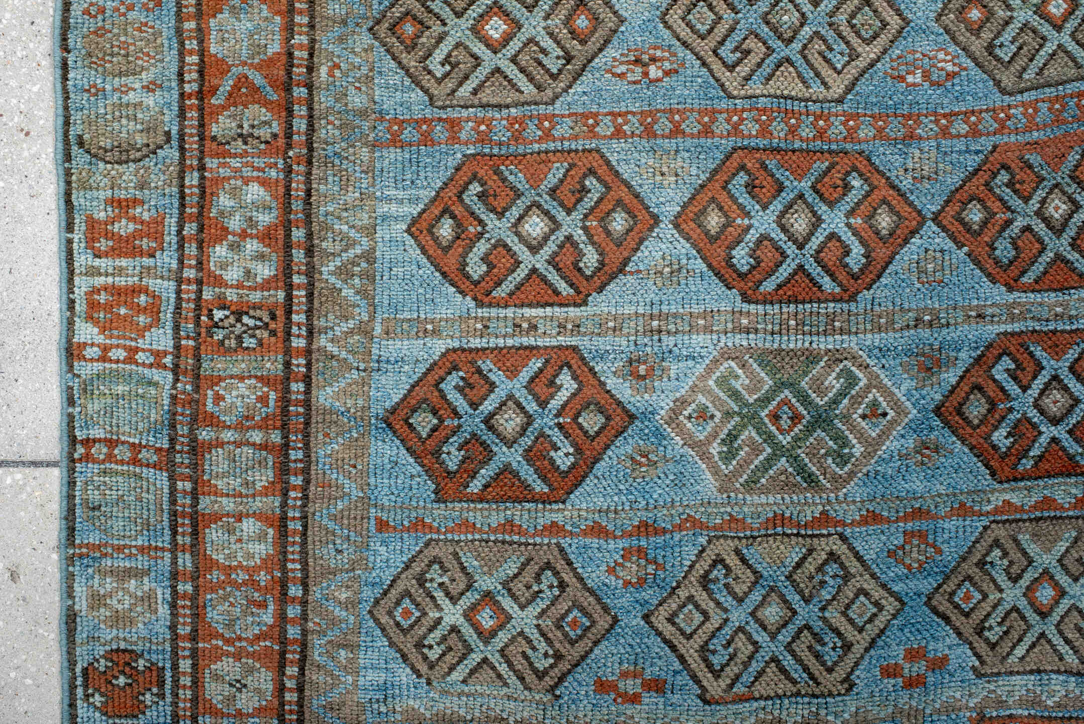 4' x 8' one-of-a-kind handmade antique Kurd runner rug. Color palette: sky blue, rust, taupe, ivory, slate, camel