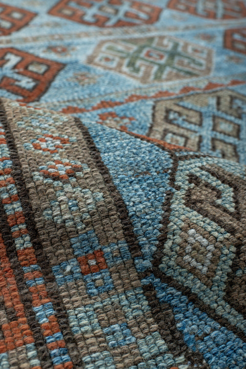 4' x 8' one-of-a-kind handmade antique Kurd runner rug. Color palette: sky blue, rust, taupe, ivory, slate, camel