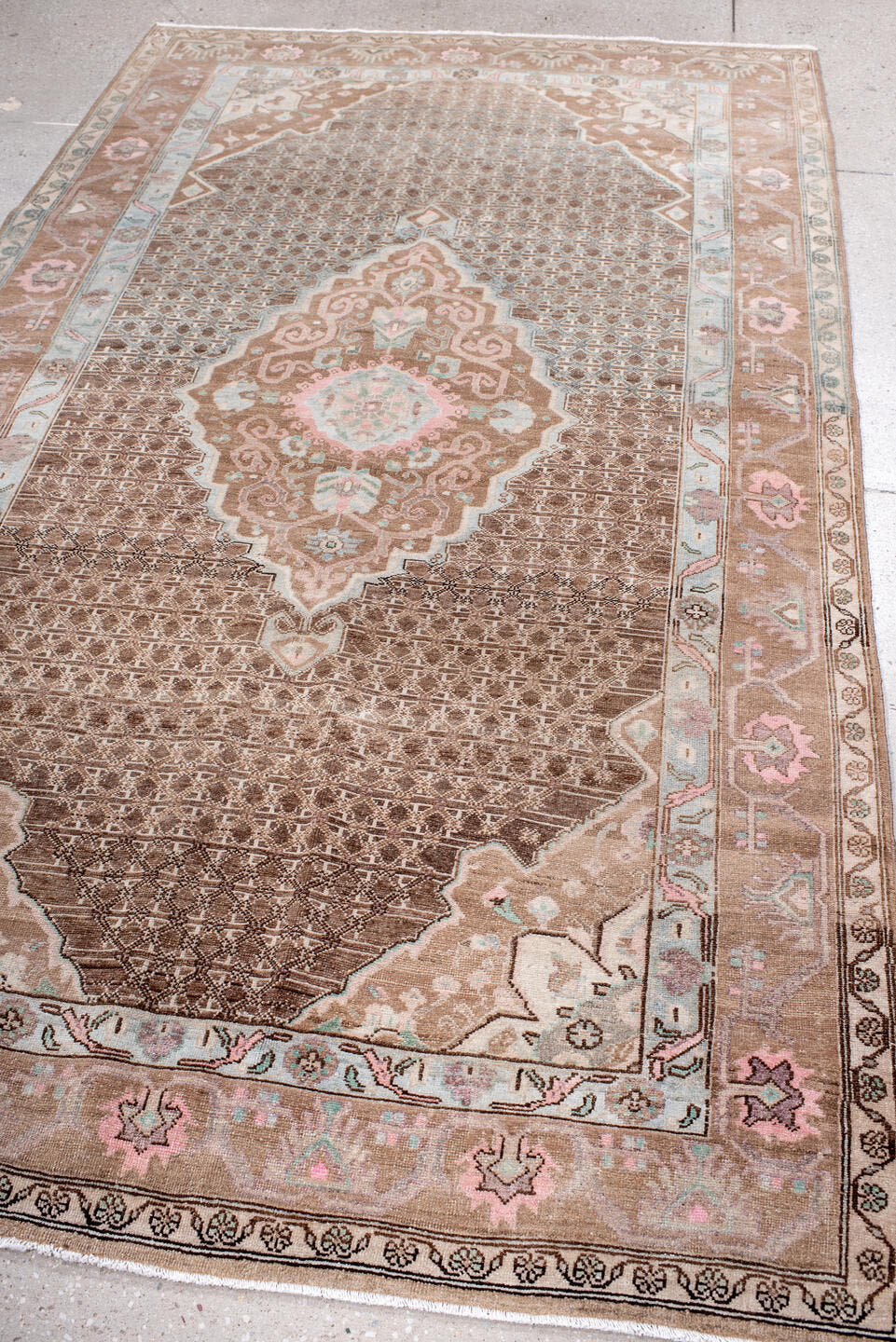 5' x 8' one-of-a-kind handmade antique Sarouk medium size rug. Color palette: taupe, brown, ivory, blush, pale blue, rose