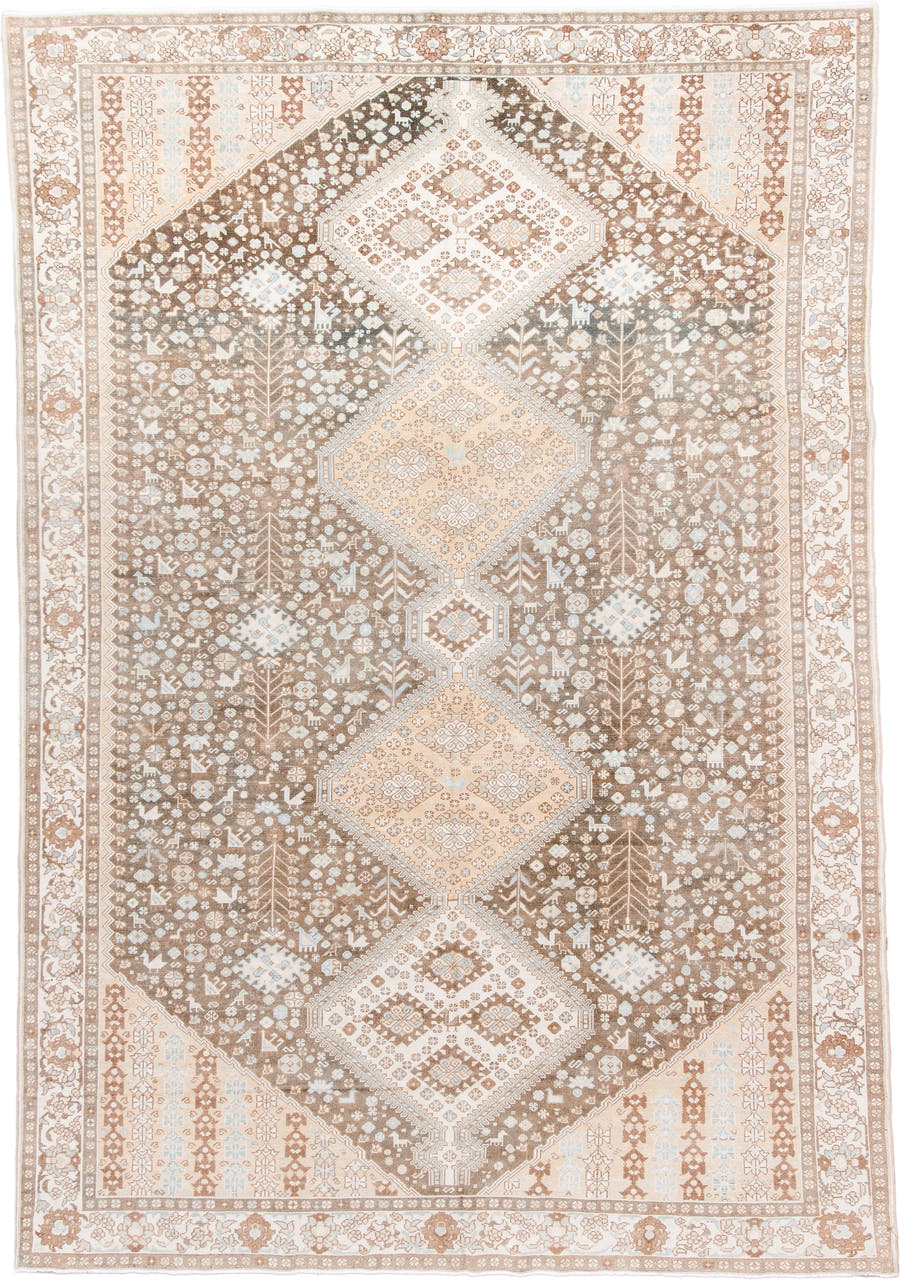 7' x 11' one-of-a-kind handmade antique  large size rug. Color palette: taupe, ivory, camel, pale_blue, tan, beige, gray
