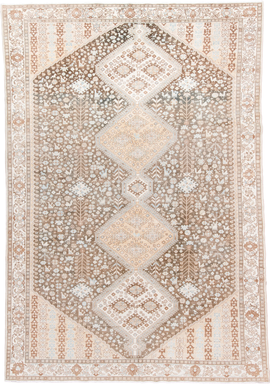 7' x 11' one-of-a-kind handmade antique  large size rug. Color palette: taupe, ivory, camel, pale_blue, tan, beige, gray