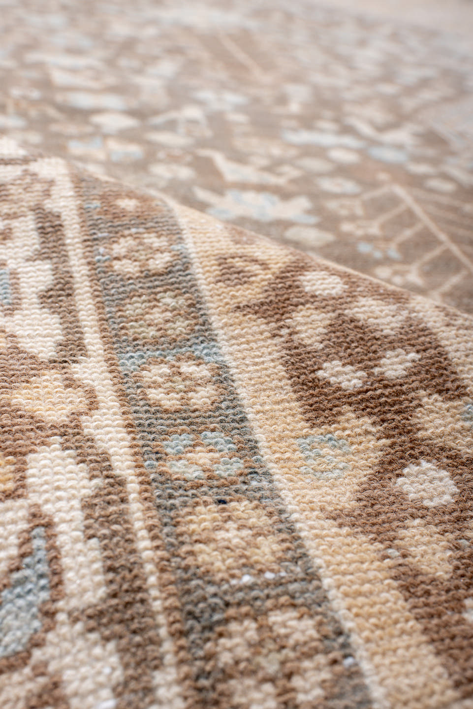 7' x 11' one-of-a-kind handmade antique  large size rug. Color palette: taupe, ivory, camel, pale_blue, tan, beige, gray