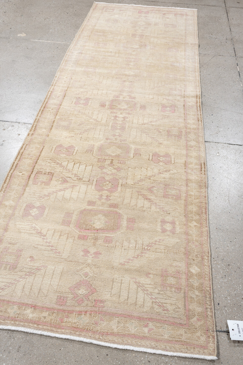 2' x 9' one-of-a-kind handmade vintage Oushak runner rug. Color palette: ivory, blush pink, taupe, beige, sand, pink, gray