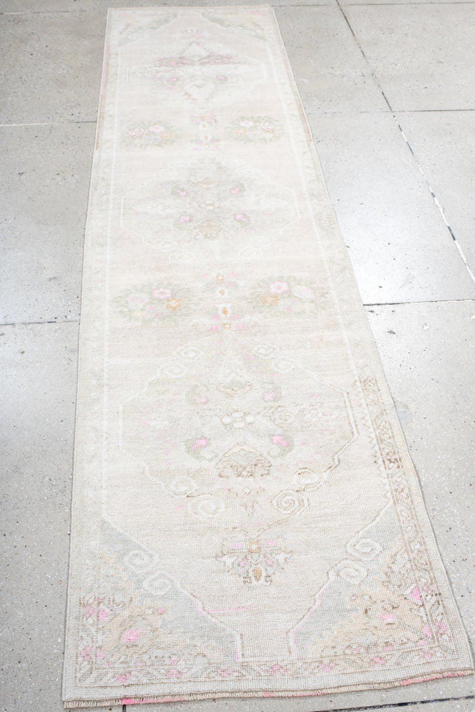 2' x 9' one-of-a-kind handmade antique Anatolian runner rug. Color palette: ivory, cream, blush, pale pink, taupe, sage