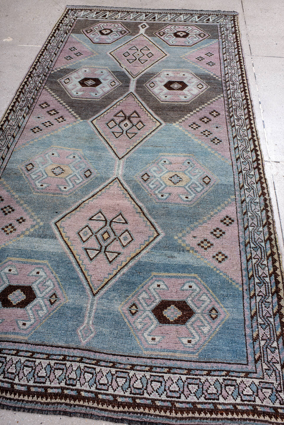 4' x 8' one-of-a-kind handmade antique Gabbe rug. Color palette: sky blue, lavender, charcoal, ivory, brown, blush, taupe