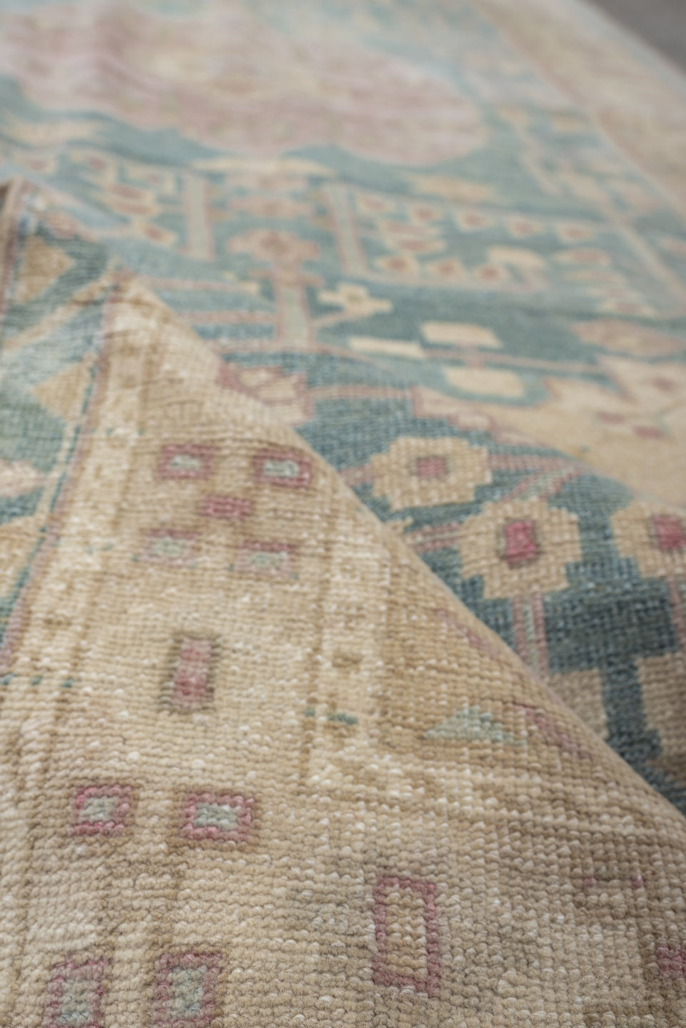 4' x 9' one-of-a-kind handmade vintage Saraband runner rug. Color palette: sky blue, ivory, blush, cream, taupe, sage, rose