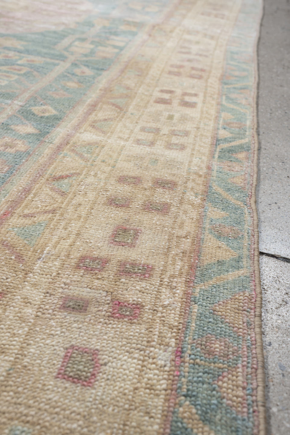 4' x 9' one-of-a-kind handmade vintage Saraband runner rug. Color palette: sky blue, ivory, blush, cream, taupe, sage, rose
