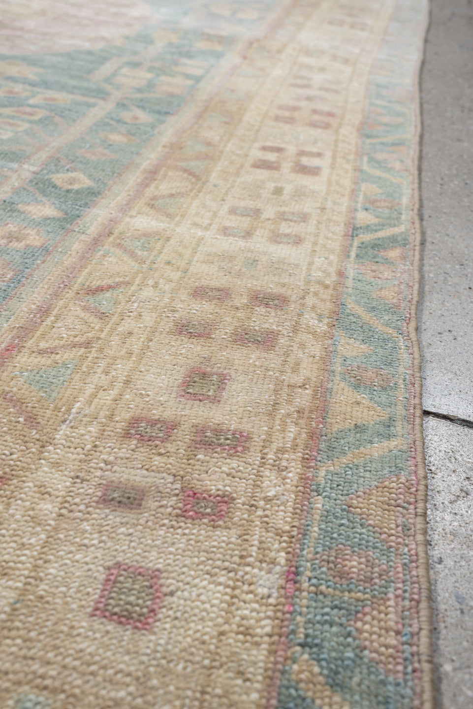 4' x 9' one-of-a-kind handmade vintage Saraband runner rug. Color palette: sky blue, ivory, blush, cream, taupe, sage, rose