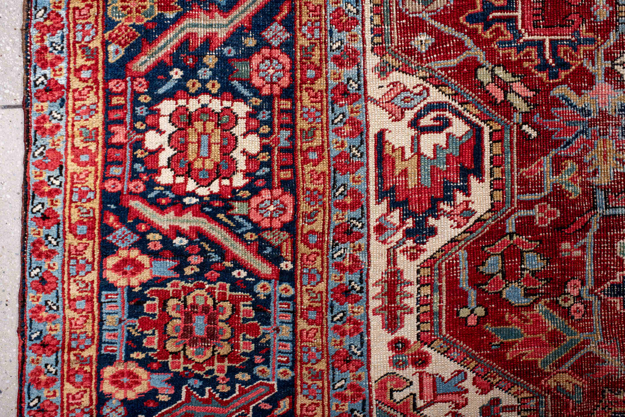 10' x 14' one-of-a-kind handmade antique Heriz large size rug. Color palette: rust, navy, ivory, sky_blue, crimson, coral