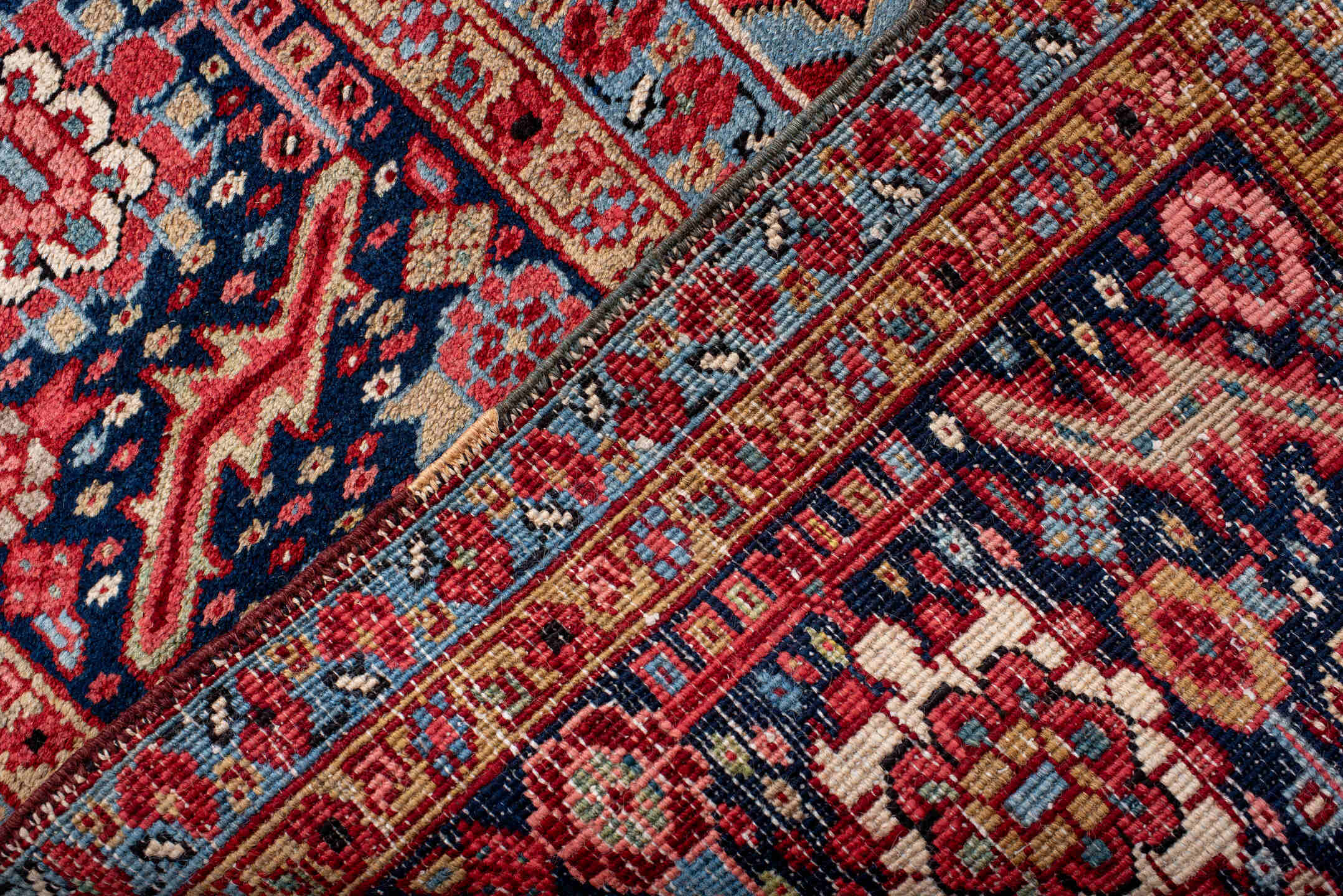 10' x 14' one-of-a-kind handmade antique Heriz large size rug. Color palette: rust, navy, ivory, sky_blue, crimson, coral