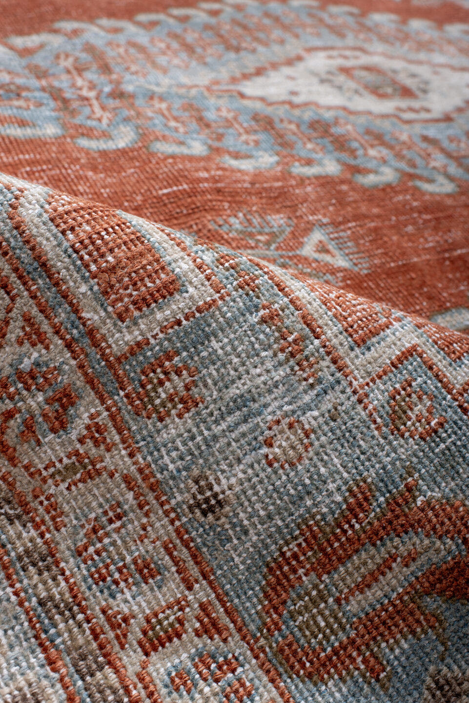 7' x 8' one-of-a-kind handmade antique Veece rug. Color palette: rust, pale blue, ivory, taupe, camel, terracotta, brown