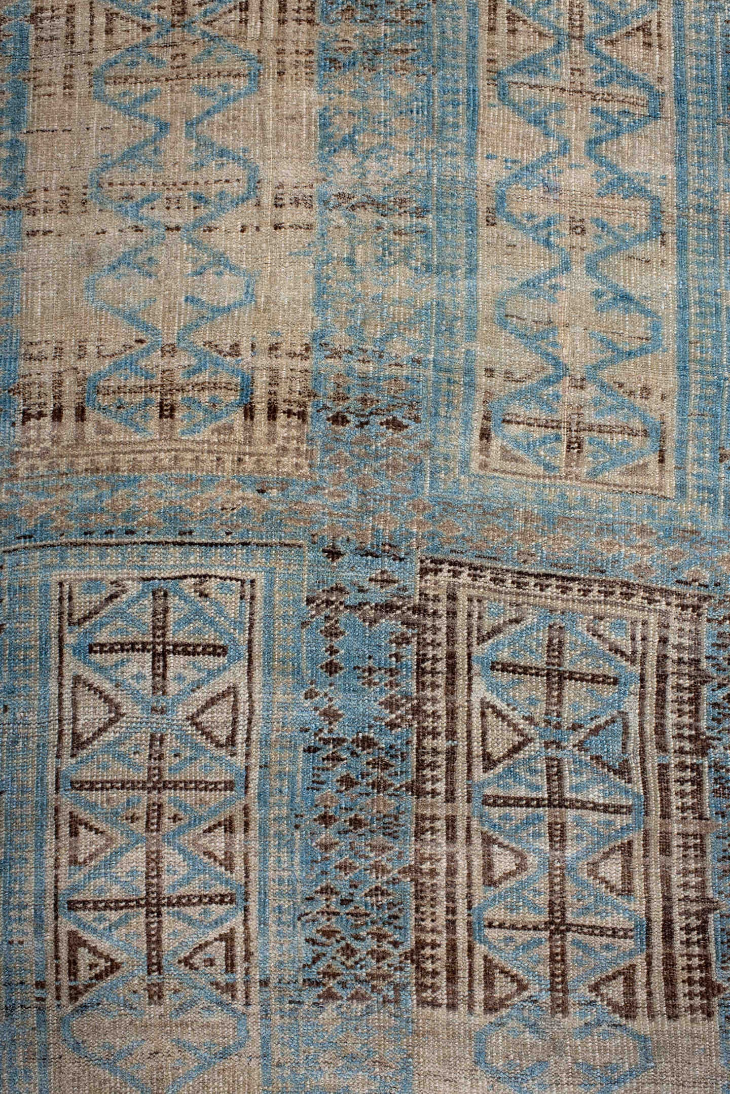 6' x 9' one-of-a-kind handmade antique Belouch medium size rug. Color palette: ivory, sky blue, brown, charcoal, taupe