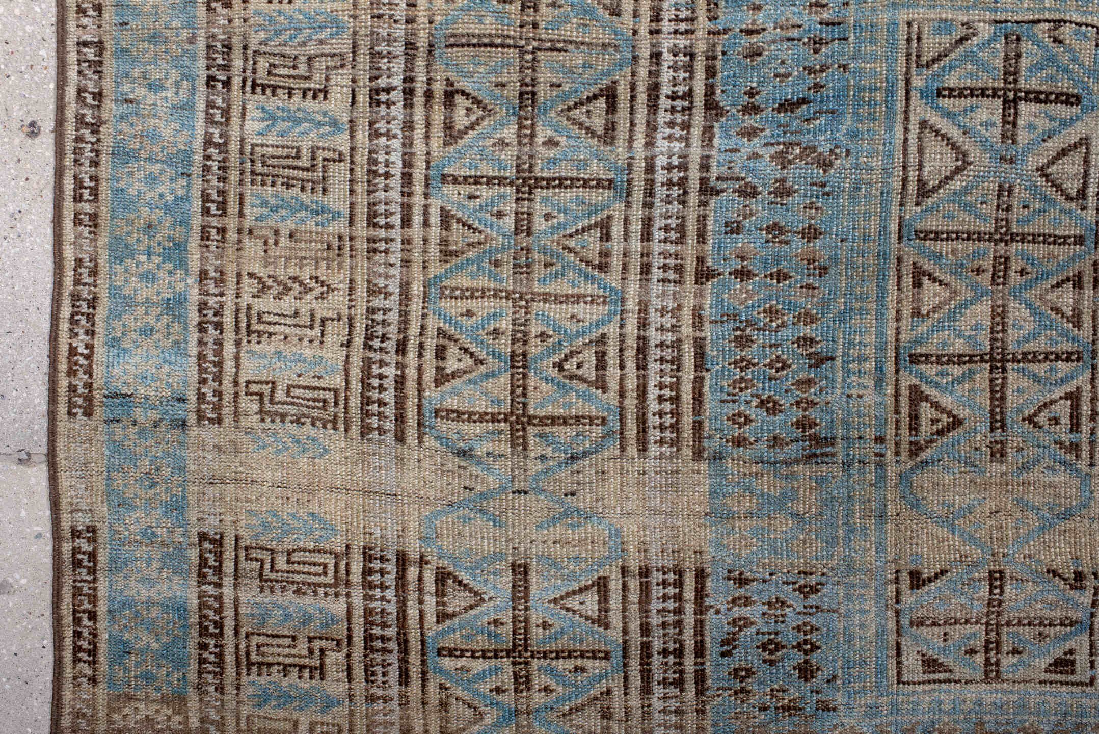 6' x 9' one-of-a-kind handmade antique Belouch medium size rug. Color palette: ivory, sky blue, brown, charcoal, taupe