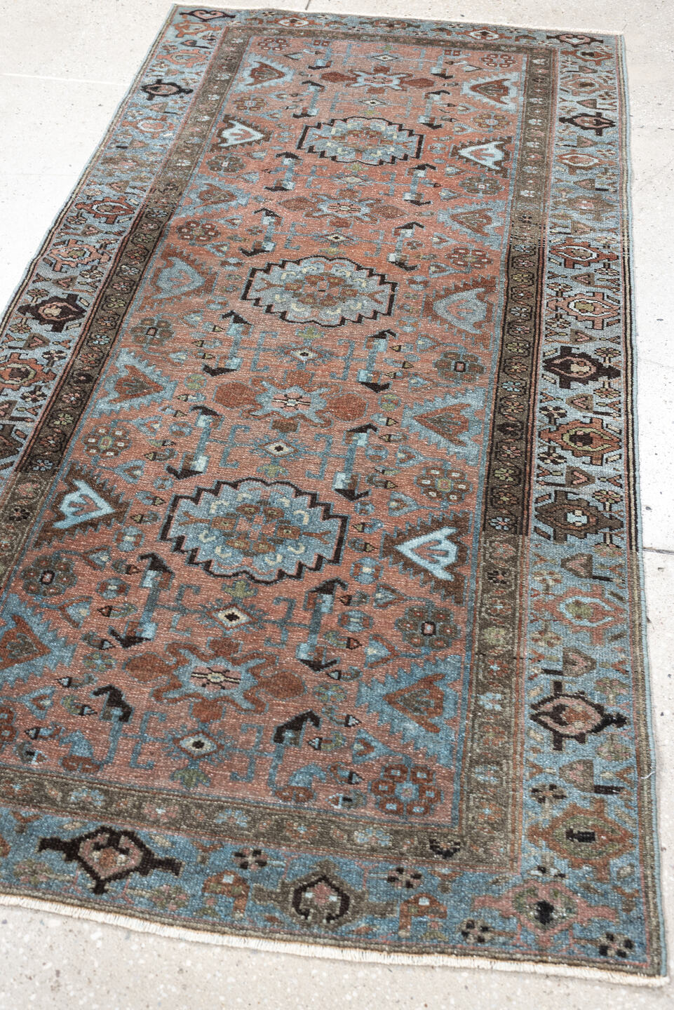 3' x 6' one-of-a-kind handmade antique Lilian runner rug. Color palette: sky blue, terracotta, brown, charcoal, taupe, ivory