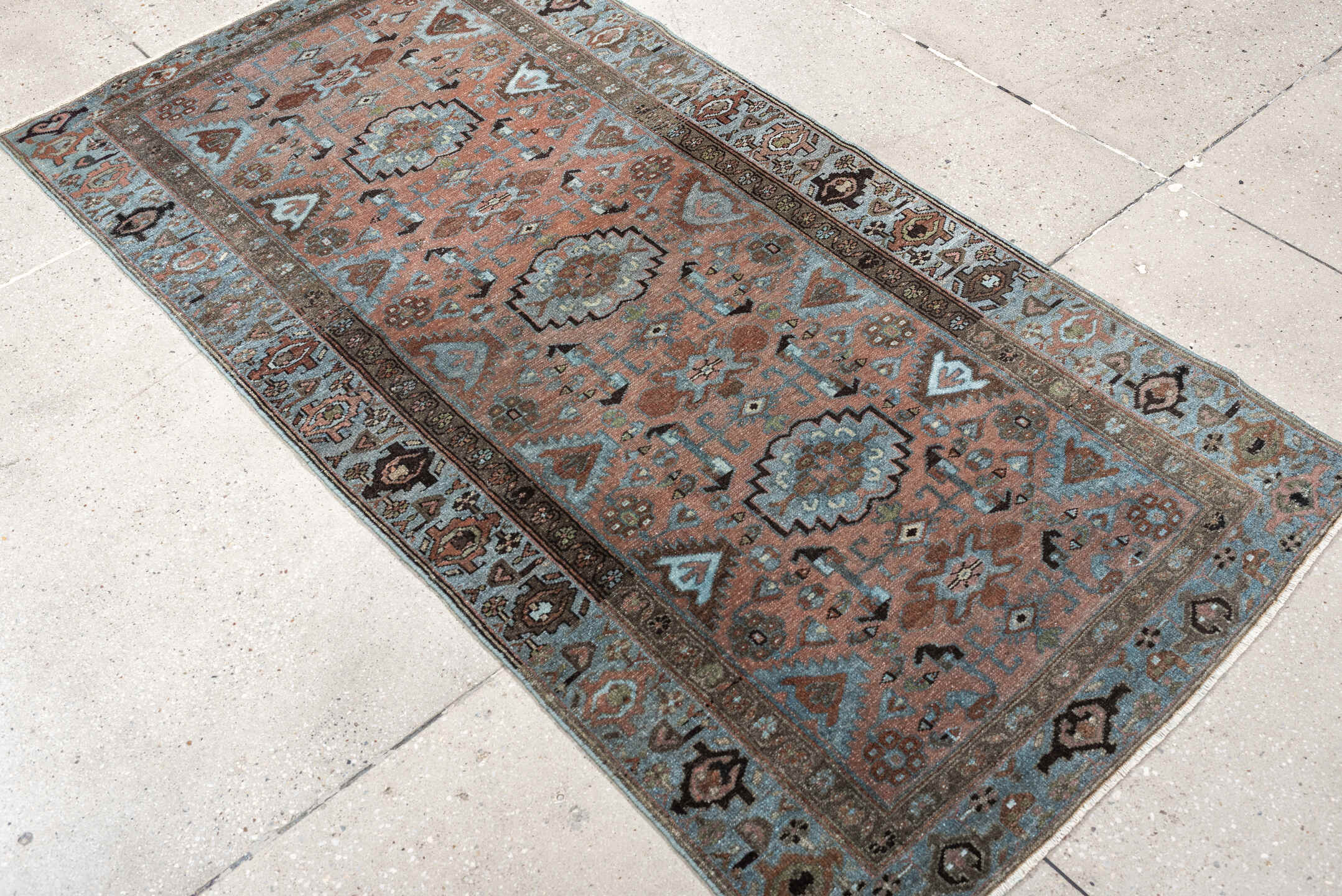 3' x 6' one-of-a-kind handmade antique Lilian runner rug. Color palette: sky blue, terracotta, brown, charcoal, taupe, ivory