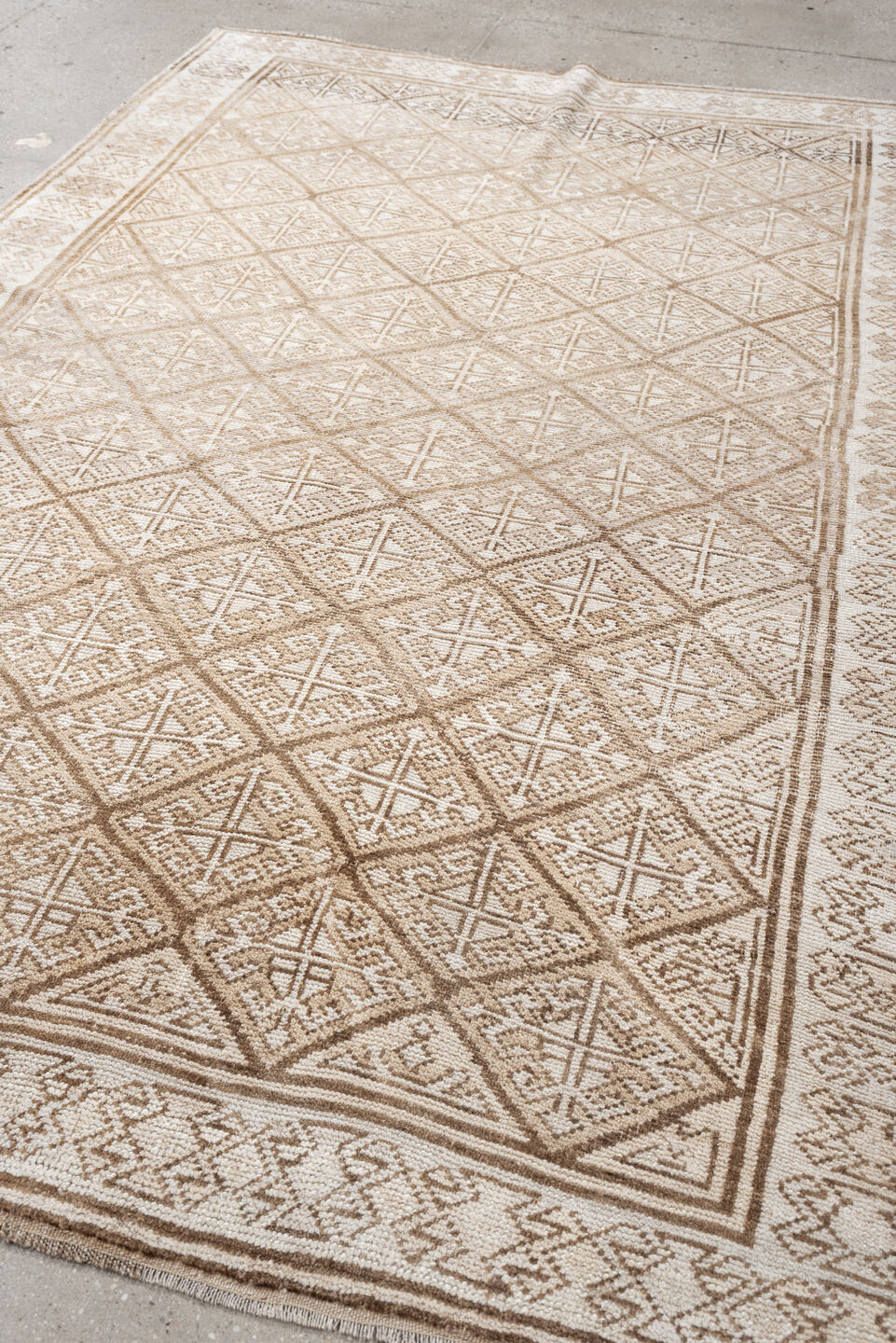 5' x 7' one-of-a-kind handmade antique medium size rug. Color palette: ivory, camel, taupe, beige, sand, gray