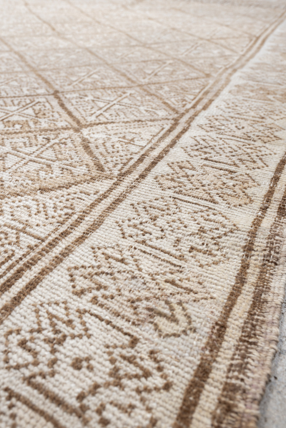 5' x 7' one-of-a-kind handmade antique medium size rug. Color palette: ivory, camel, taupe, beige, sand, gray