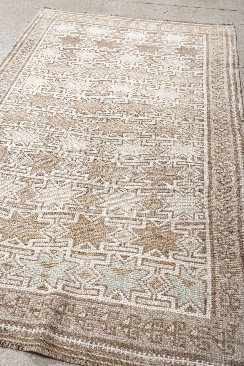 4' x 6' one-of-a-kind handmade antique Kurd small size rug. Color palette: ivory, camel, taupe, sand, beige, gray