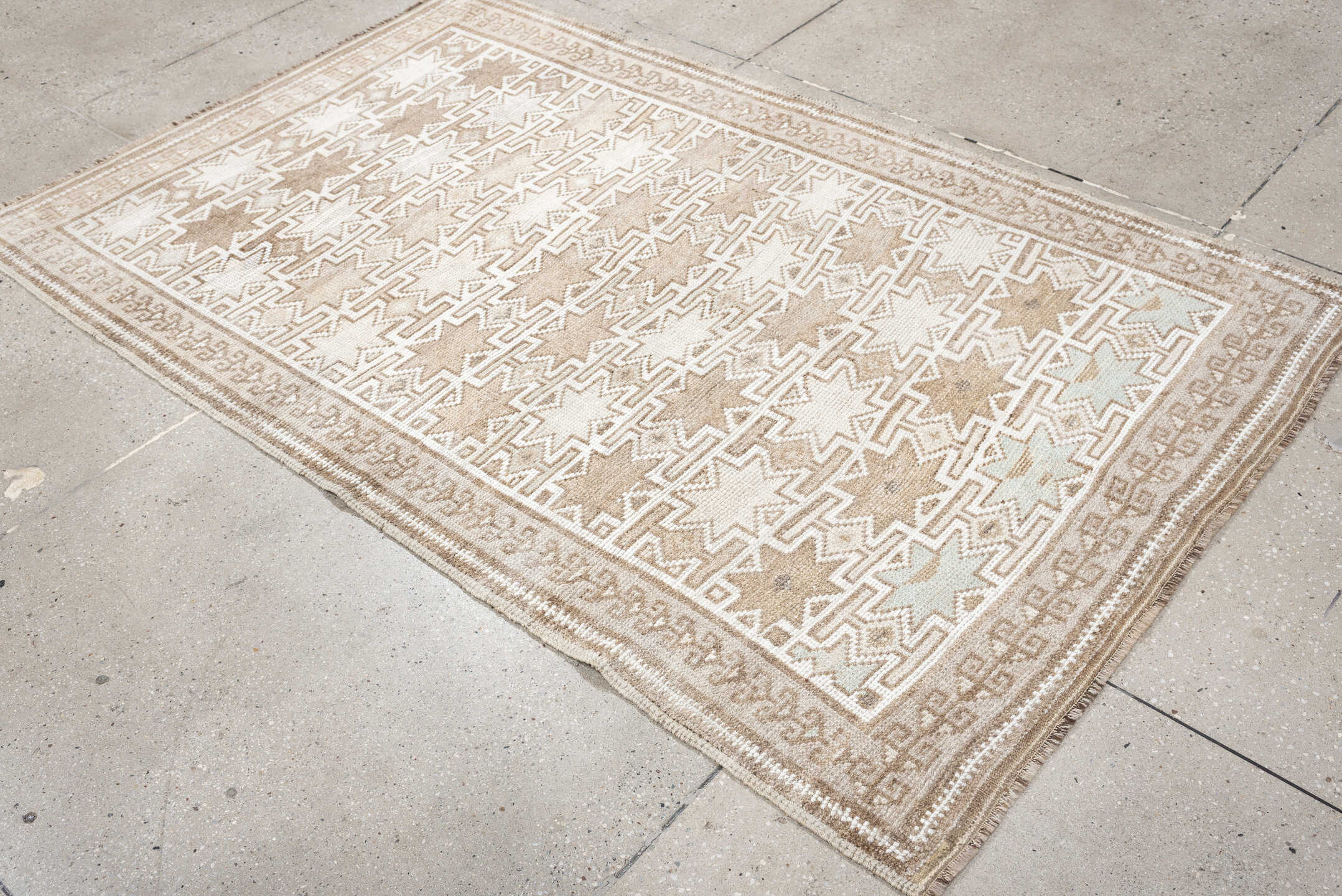 4' x 6' one-of-a-kind handmade antique Kurd small size rug. Color palette: ivory, camel, taupe, sand, beige, gray