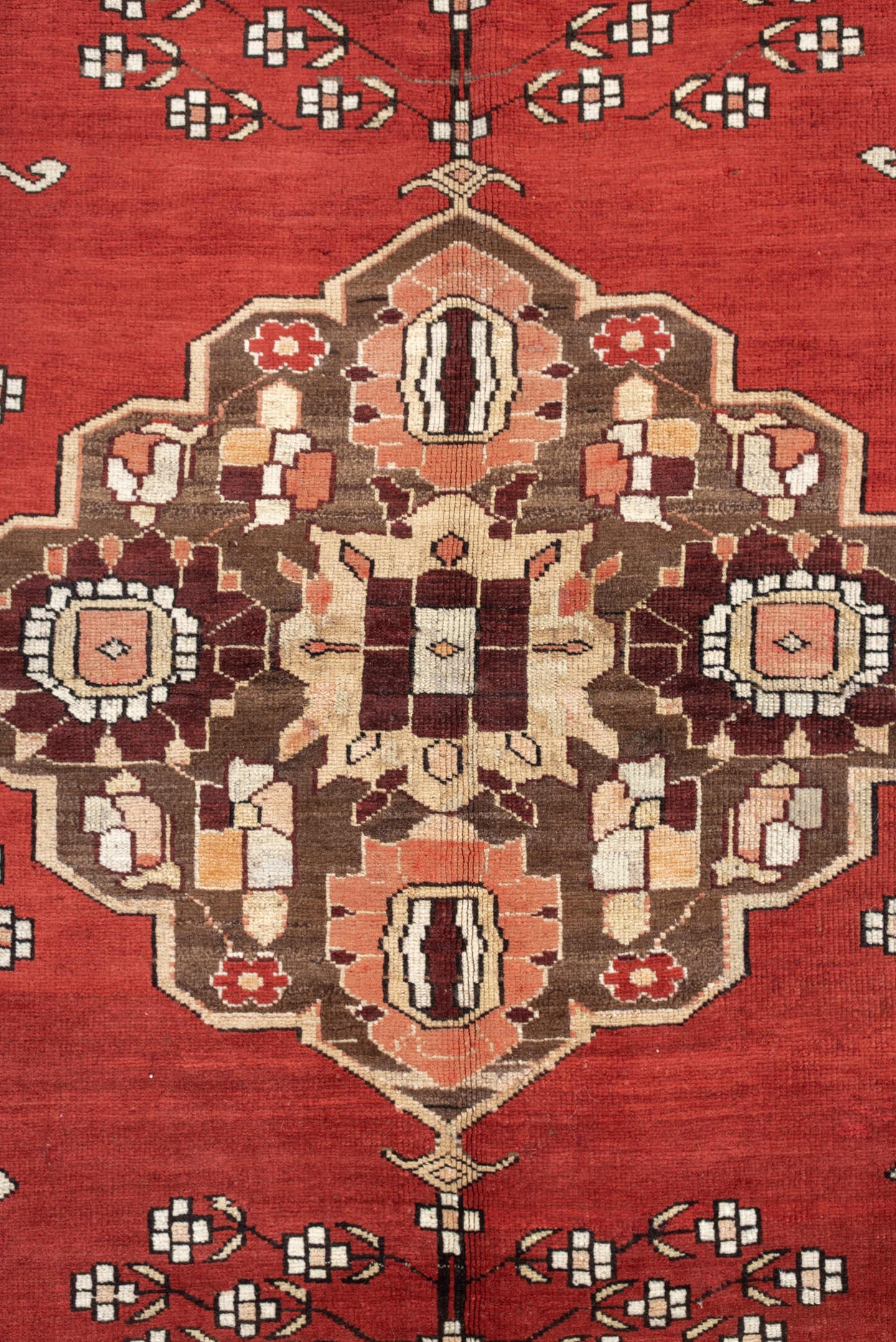 5' x 6' one-of-a-kind handmade antique Caucasian rug. Color palette: terracotta, ivory, taupe, brown, rose, mahogany, camel