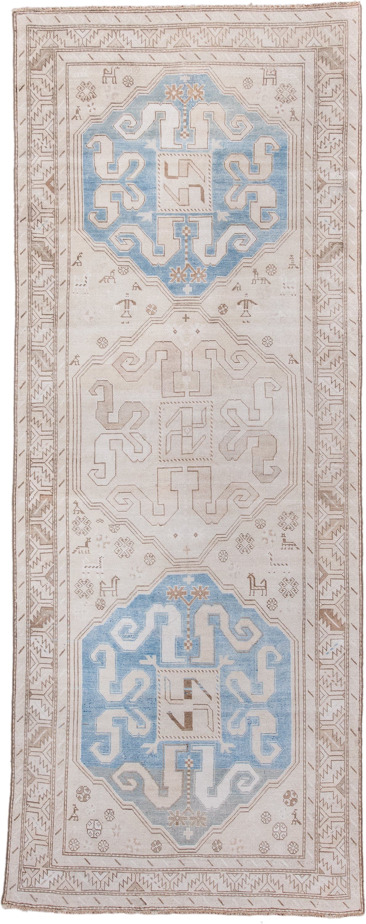 4' x 10' one-of-a-kind handmade vintage Caucasian runner rug. Color palette: ivory, sky blue, taupe, camel, beige