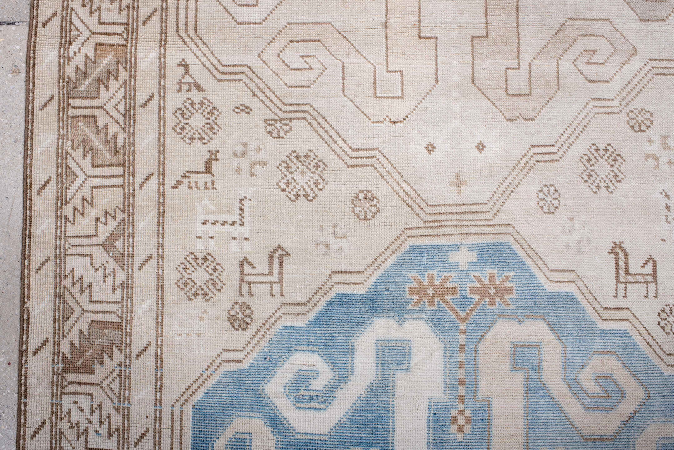 4' x 10' one-of-a-kind handmade vintage Caucasian runner rug. Color palette: ivory, sky blue, taupe, camel, beige