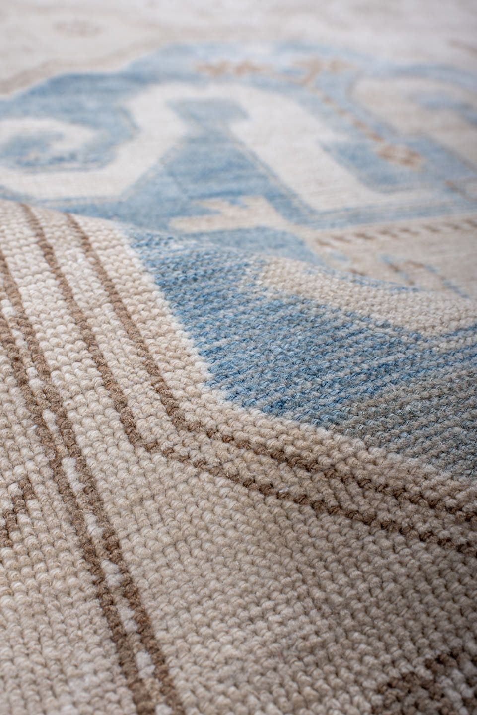 4' x 10' one-of-a-kind handmade vintage Caucasian runner rug. Color palette: ivory, sky blue, taupe, camel, beige