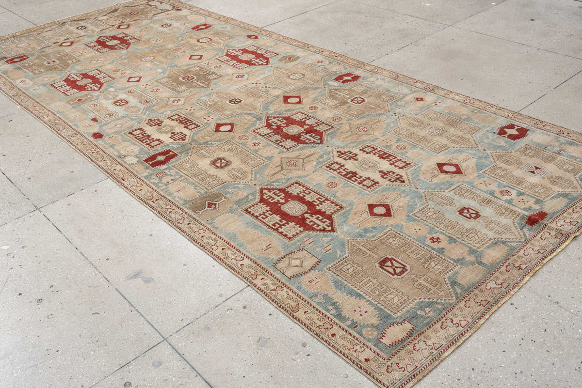 5' x 12' one-of-a-kind handmade vintage NW Persian rug. Color palette: ivory, sky blue, taupe, rust, beige, light blue, gray