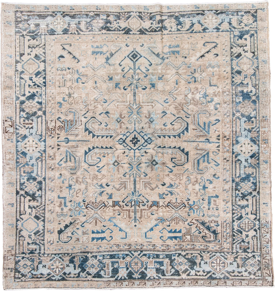 7' x 7' one-of-a-kind handmade antique Heriz rug. Color palette: ivory, beige, slate, taupe, sky blue, charcoal, gray